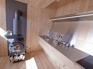 Illustration for article titled This Alpine House Looks Like It Was Beamed Down From Outer Space